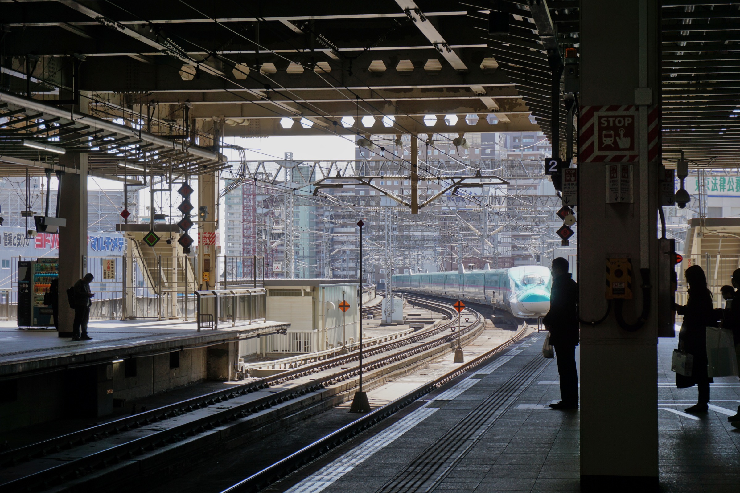 Hayabusa Shinkansen arriving at Sendai Station platform from Tokyo direction