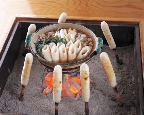 Traditional kiritanpo rice cylinders on cedar skewers