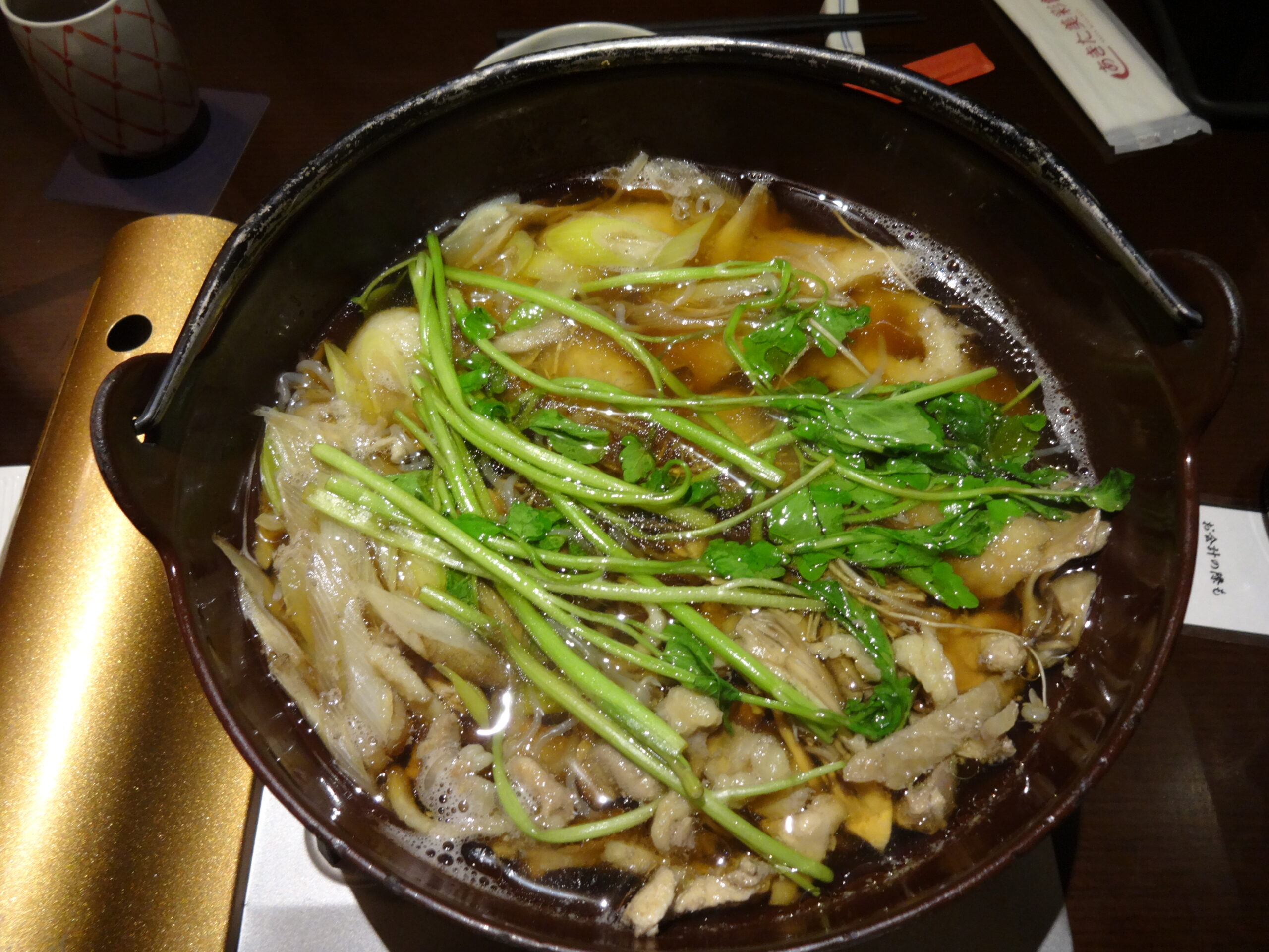Traditional nabe hot pot from Akita region with winter vegetables and broth