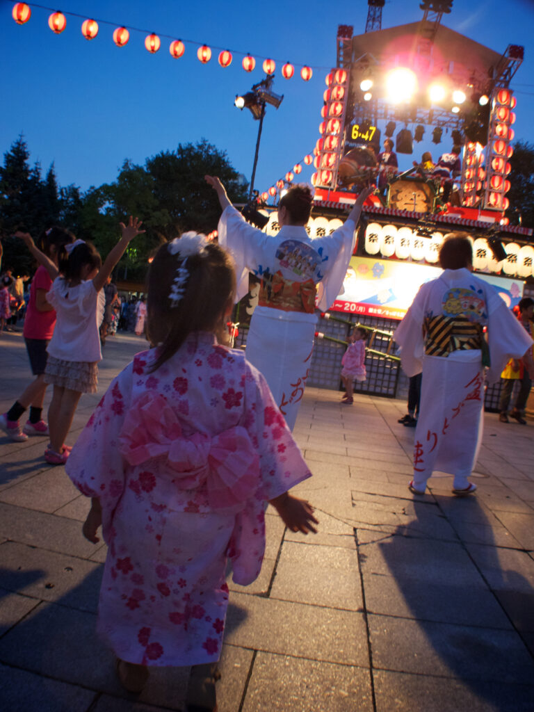 Bon festival communal dance in summer yukata, Japan