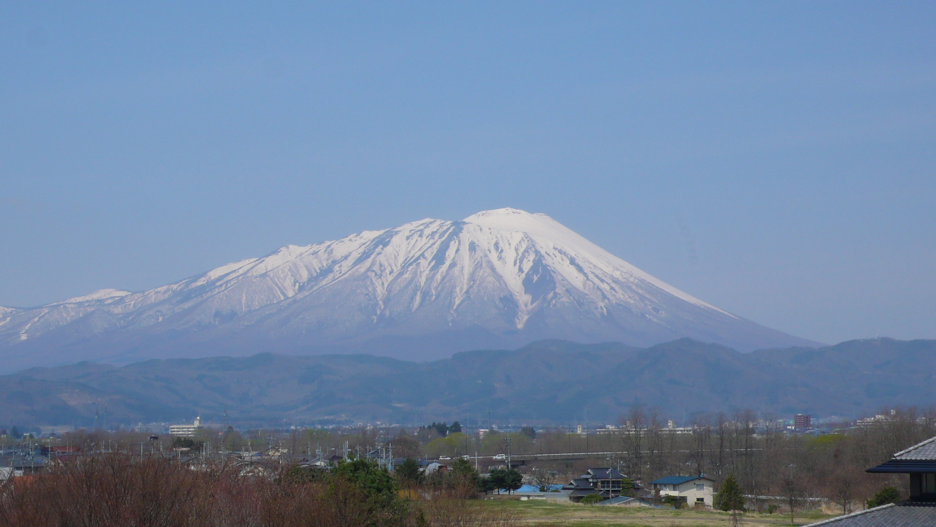 Mount Iwate rising above the Iwate Prefecture landscape, a volcano with perfect cone shape