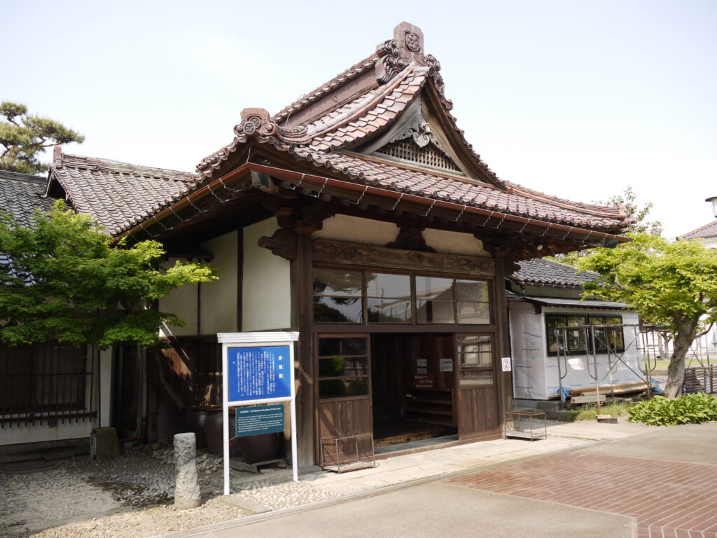 The Goinden building at Chido Museum in Tsuruoka, a Meiji-era Western-style structure in a tranquil garden setting