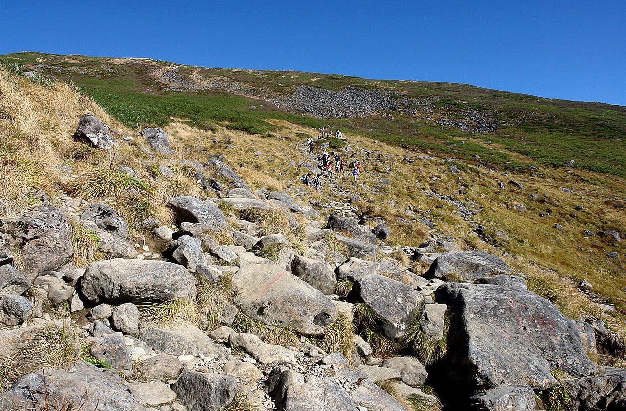 Mount Gassan slope in summer with hikers
