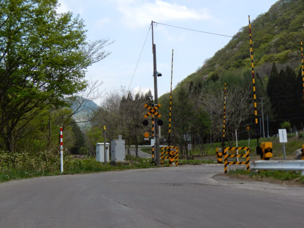 Traditional rural landscape near Hachimantai with green fields and mountains in the background