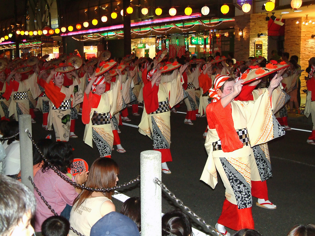 Hanagasa Festival 2002 parade with performers in traditional Japanese costume carrying flower hats