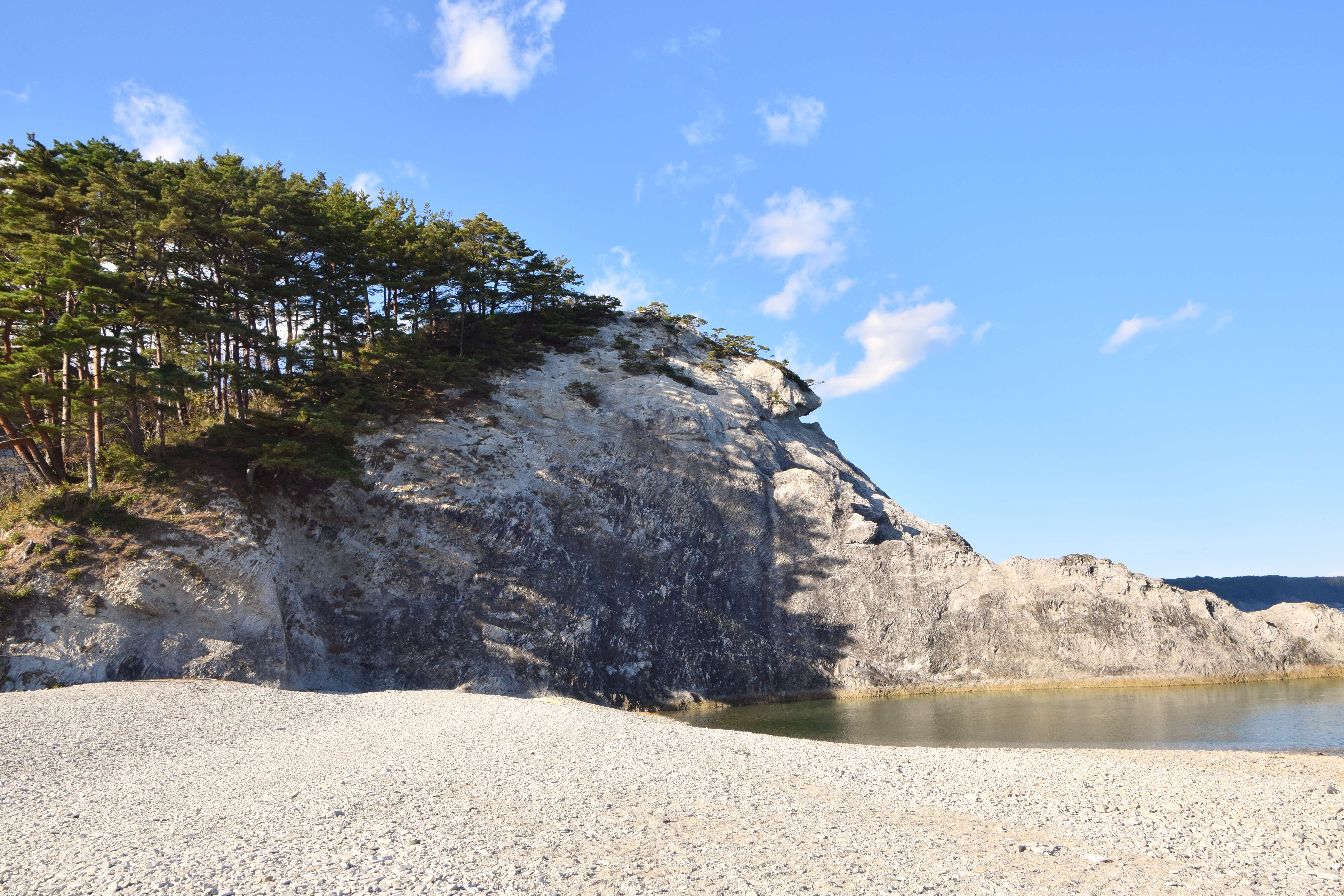White rhyolite rock formations at Jodogahama Beach