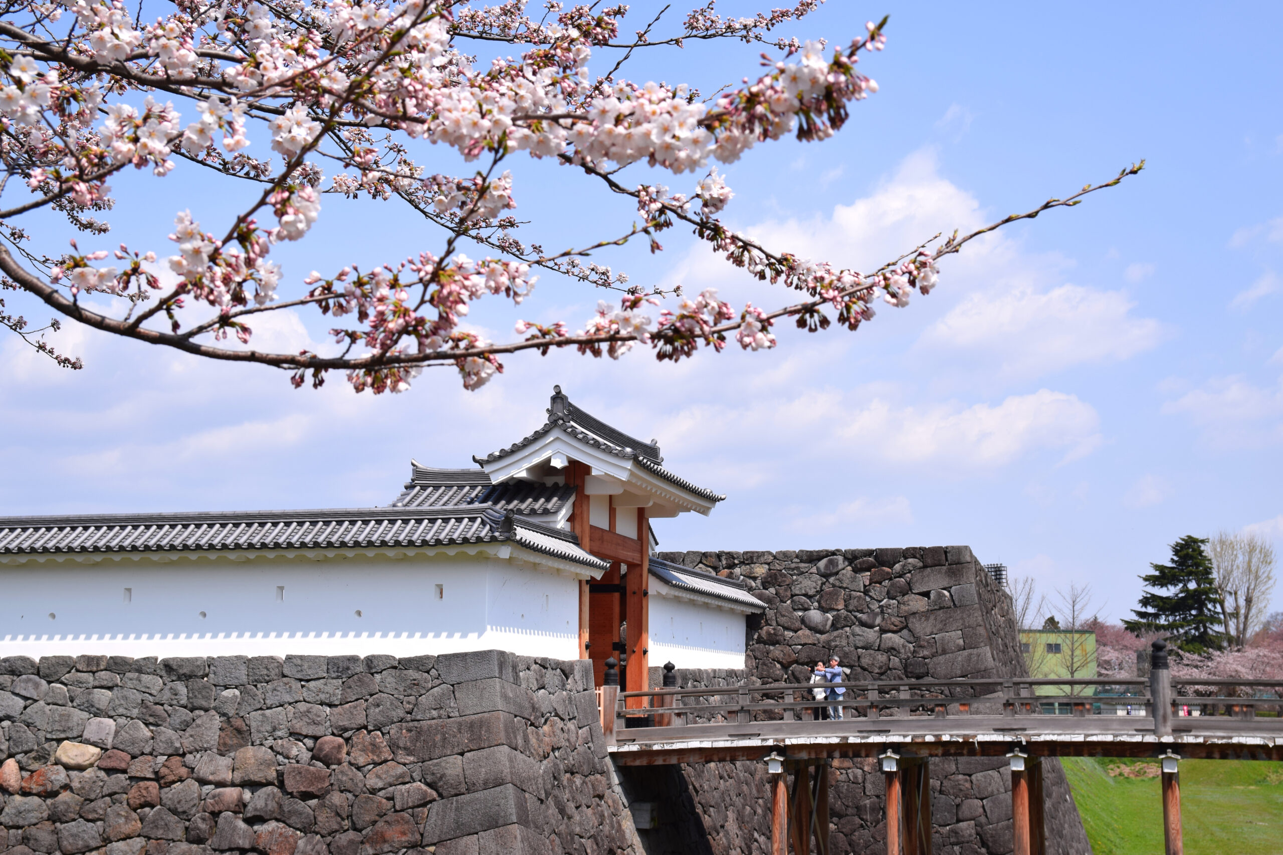 Kajo Park at Yamagata Castle with traditional stone walls and moat in spring