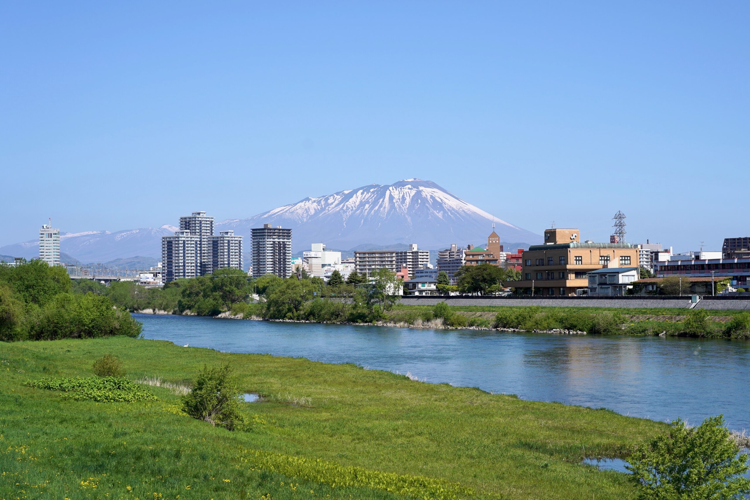 Morioka city skyline with Mount Iwate and Kitakami River in spring
