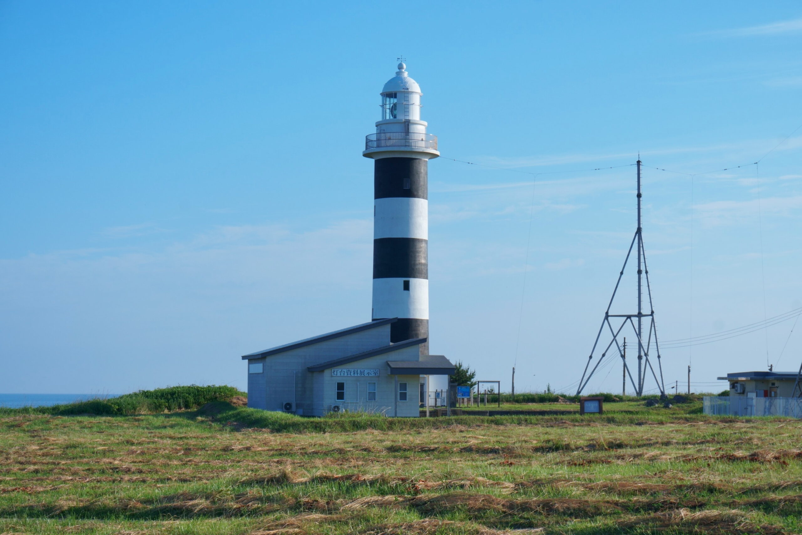 Striped Nyudozaki Lighthouse on Oga Peninsula's northern cape