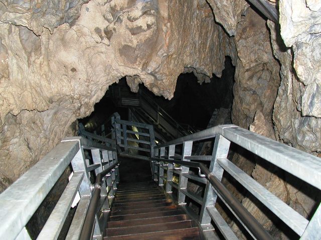 Inside Ryusendo Cave showing dramatic stalactite formations