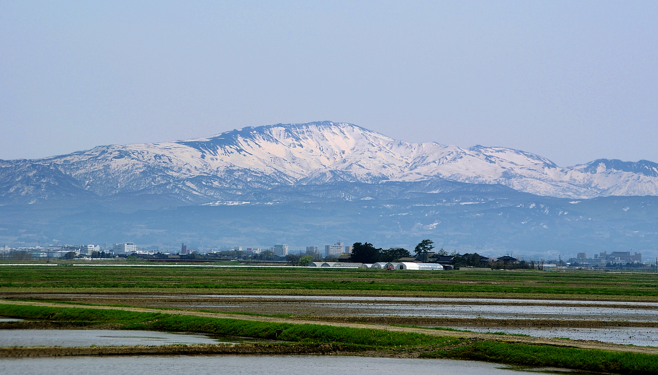 Mount Gassan seen from the surrounding Yamagata mountains with snow-capped peak