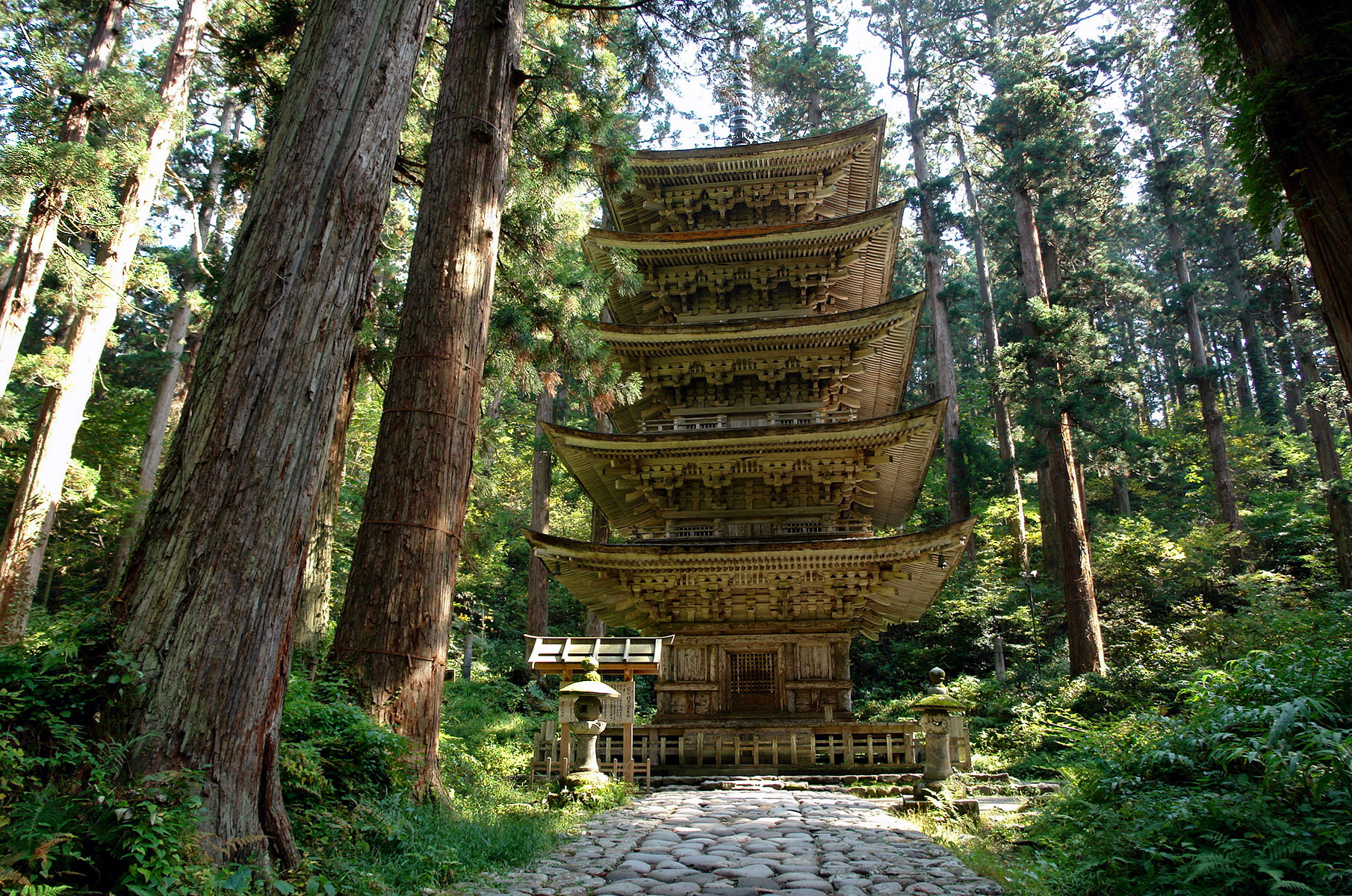 The five-story wooden pagoda (Gojunto) of Haguro-san shrine surrounded by ancient cedar forest