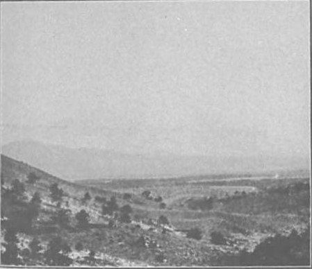 Historical photograph of Mount Iwate (Nanbu Fuji) from the Meiji era, showing the mountain's iconic cone shape from the plains below
