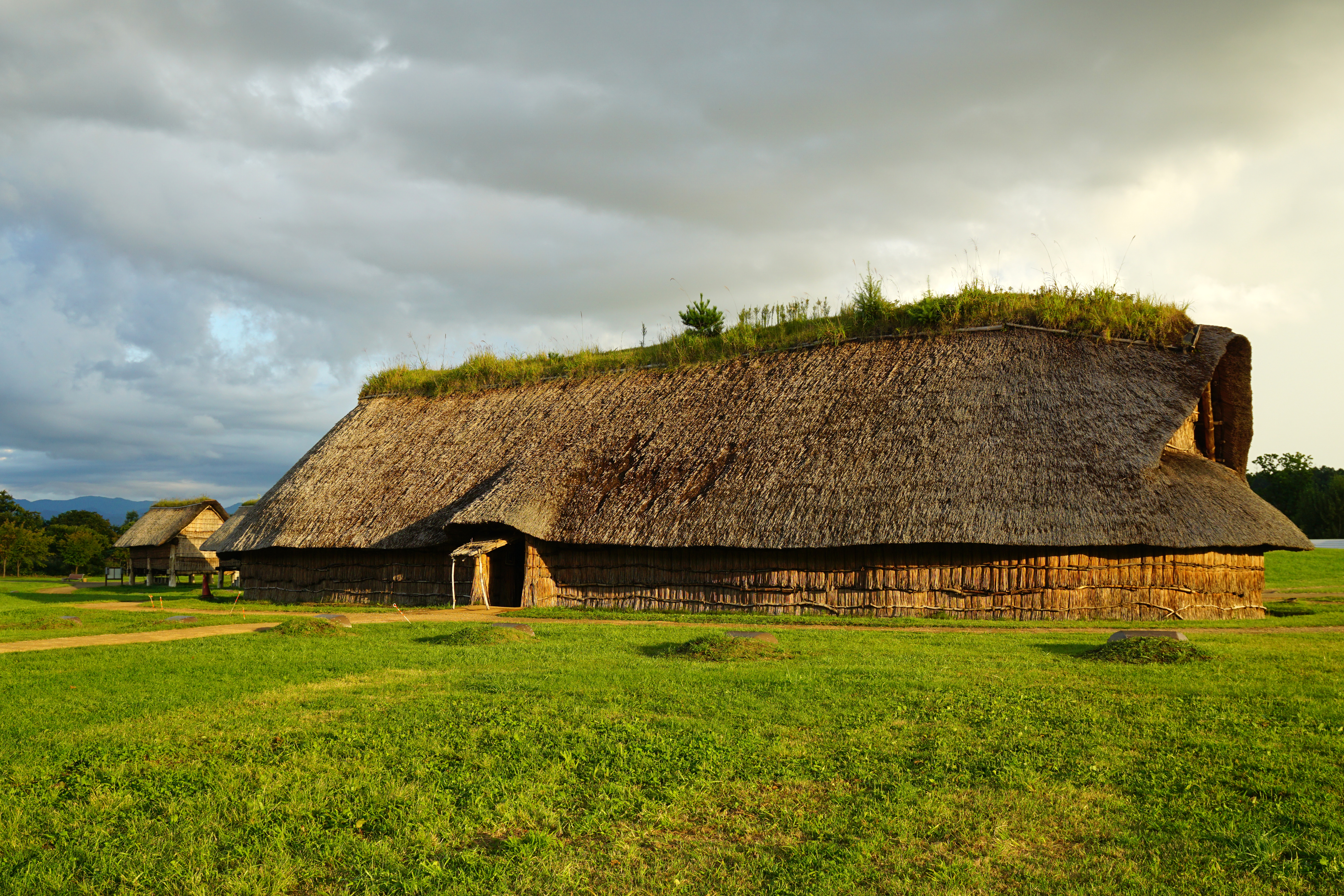 Aerial view of the Sannai-Maruyama Jomon archaeological site showing the reconstructed structures and museum