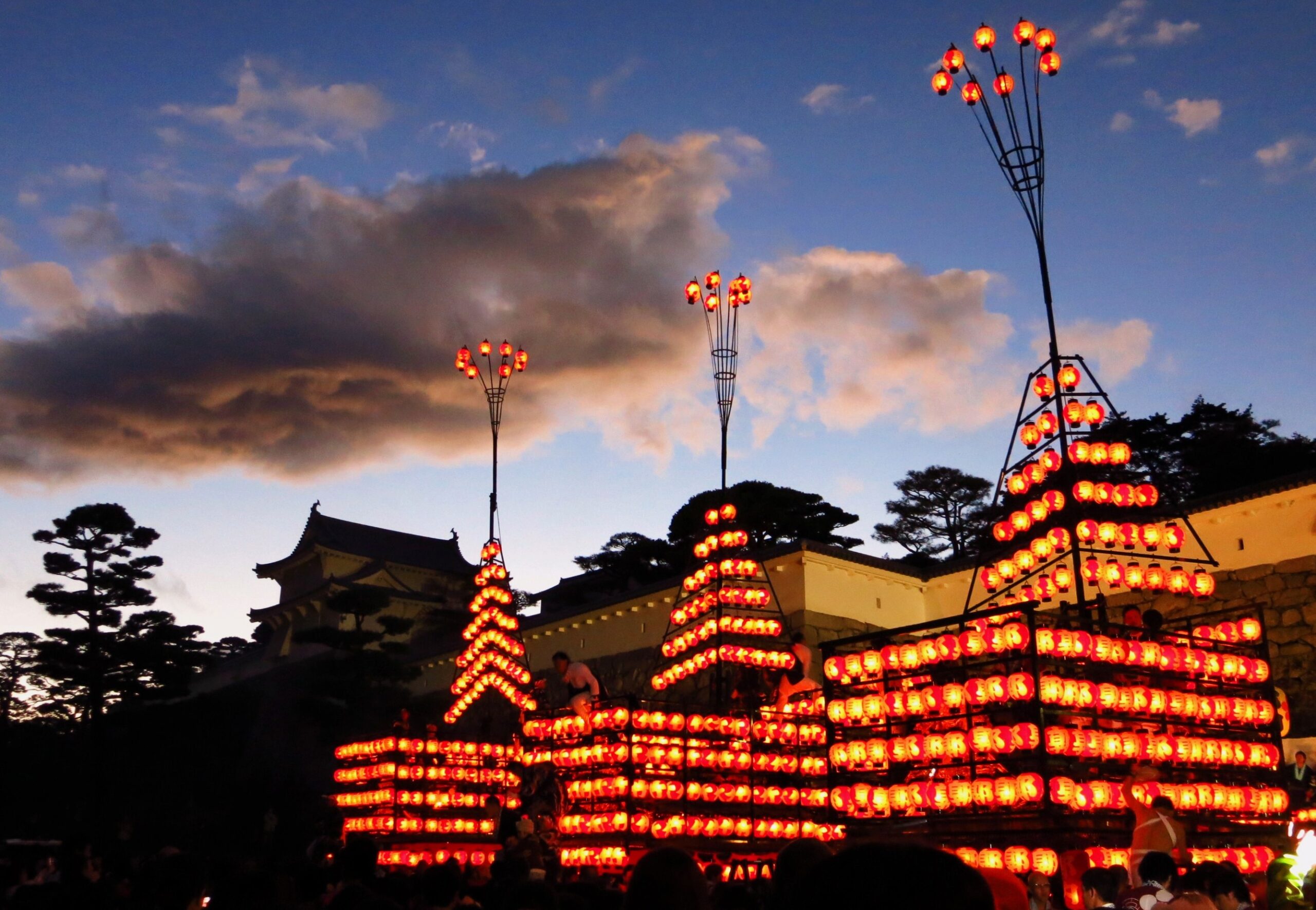 Nihonmatsu Chochin Matsuri lantern floats illuminated at night in the town streets