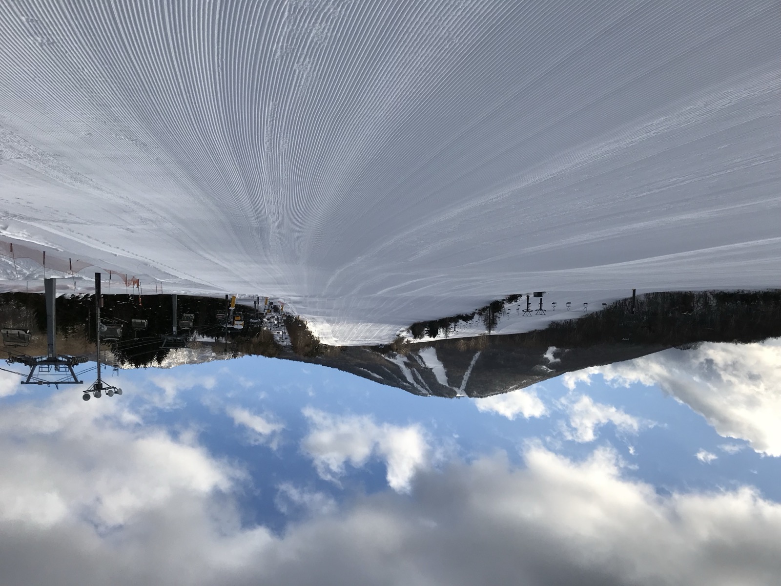 Deep powder snow and empty groomed run at Appi Kogen ski resort
