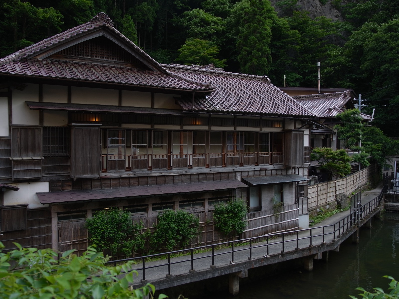 Detail of the historic architecture at Mukaitaki ryokan in Higashiyama Onsen
