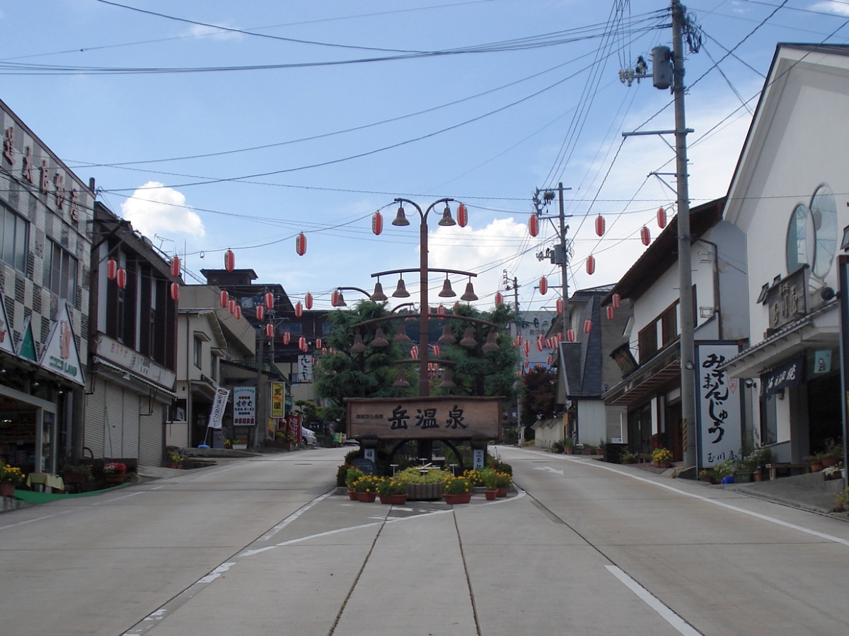 Street view of the Dake Onsen hot spring town at the base of Mount Adatara