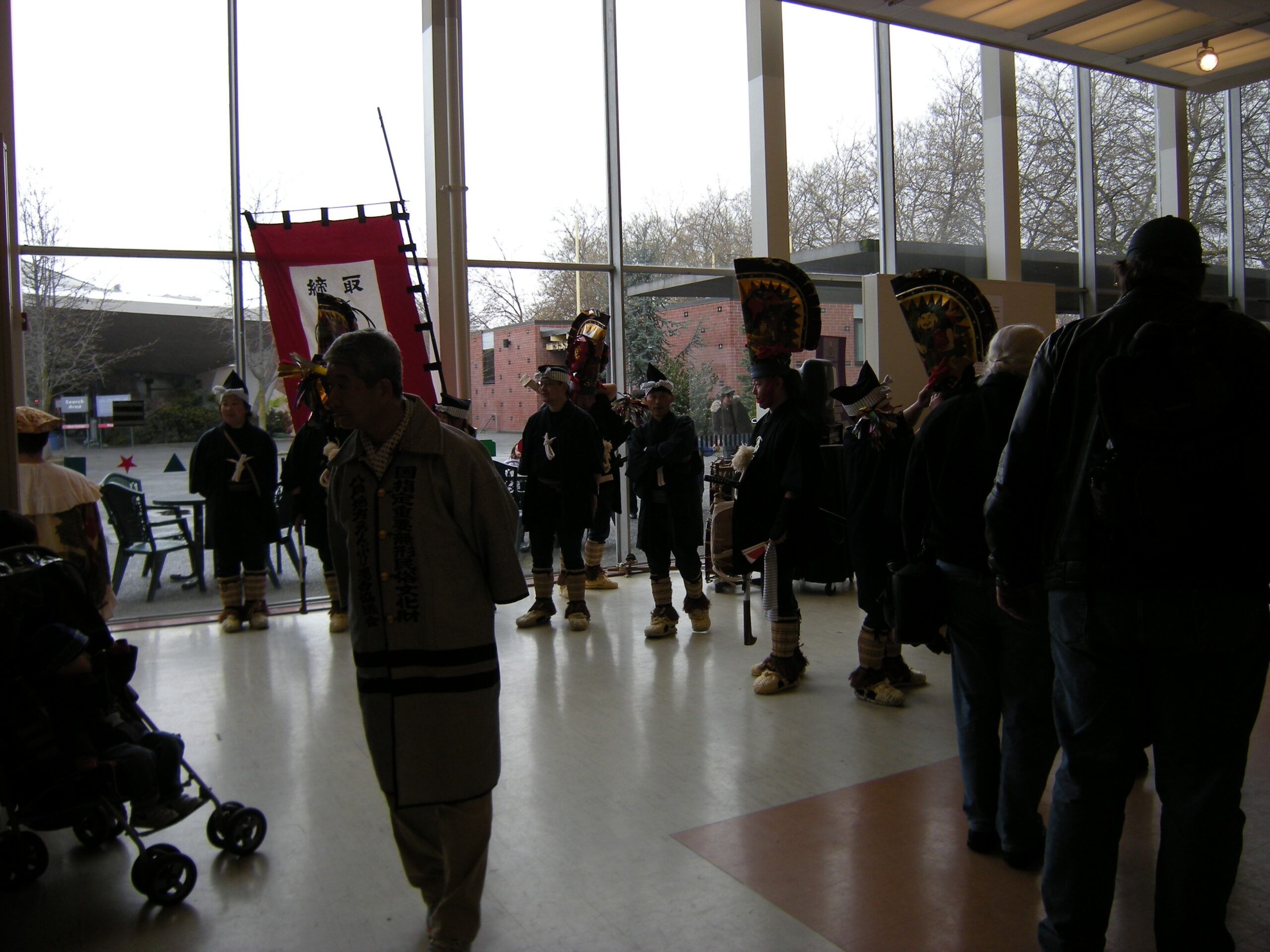 Enburi dancers in Hachinohe wearing tall horse-head shaped eboshi headdresses