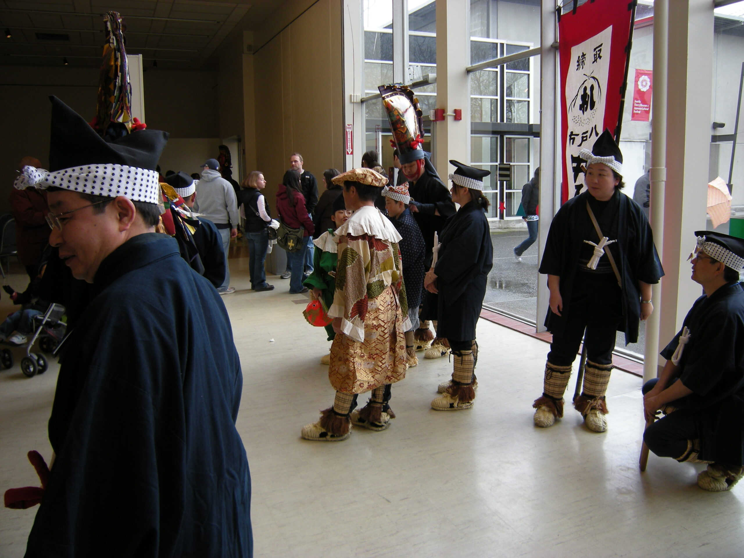 Enburi dancers in traditional costume performing the horse dance ritual