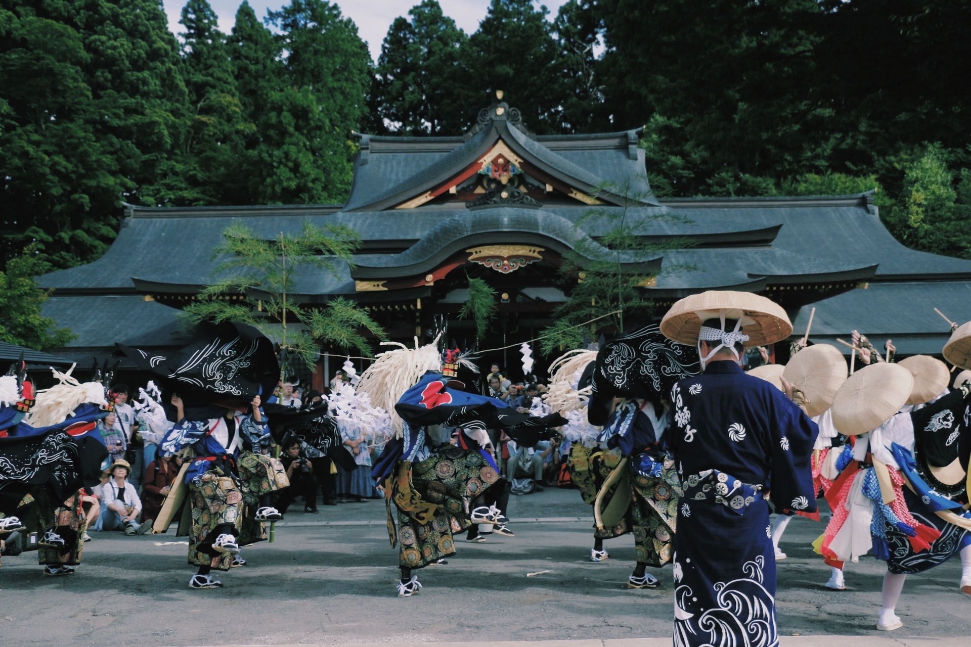 Sansa Odori dancers with fans performing traditional choreography